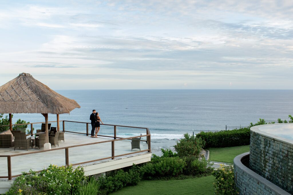 Luxury oceanfront real estate in Cyprus with a thatched roof gazebo and scenic sea views"