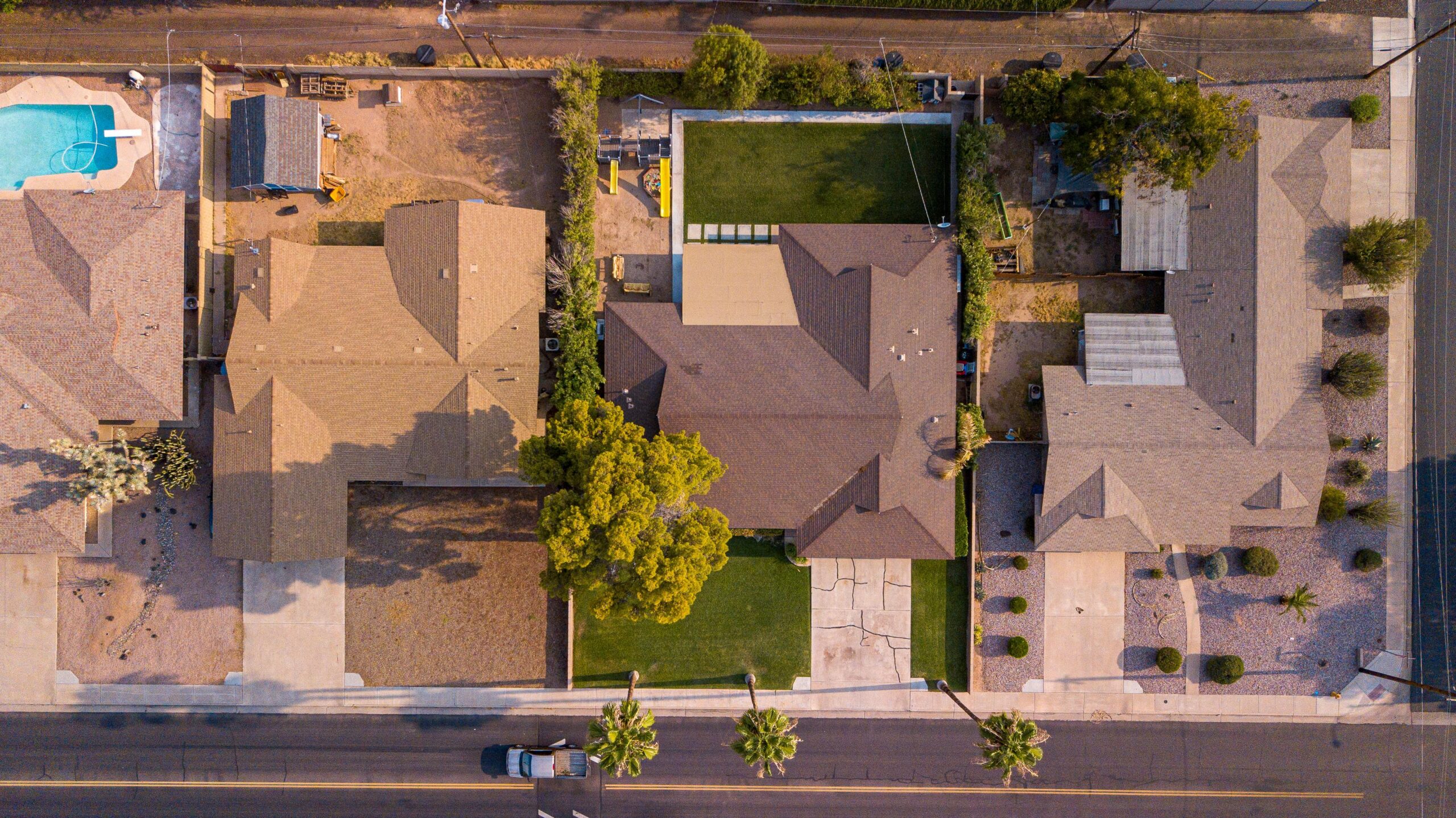 Aerial view of residential homes in Cyprus with yards and rooftops