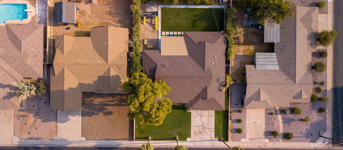 Aerial view of residential homes in Cyprus with yards and rooftops